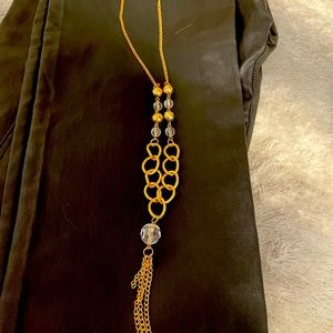 Costume jewelry. Gold with gold beads and clear beads